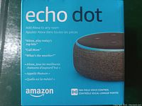 Front of the Amazon Echo Dot box showing product name, image, and key Alexa features.