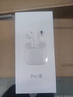 Photo of unopened Pro 4 earbuds box showing earbuds and charging case on the front.
