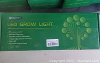 Box packaging of Semai LED grow light model PL06 showing features such as RF remote control, full light spectrum, timer with dimmable options, adjustable gooseneck heads, 80W LED, and adjustable tripod stand.
