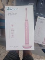 Box view showing brand Safcare, product type Sonic Electric Toothbrush, model SC-201, and product features such as 45000 vibrations per minute, smart timer, and 30 day battery life