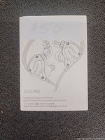 Front of the ZS10 Pro earphones box showing an artistic line drawing of the earphones and text describing the model and features.