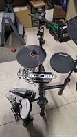 Assembled drum kit with module, rack, pads and pedals