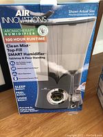 Front-facing photo of Air Innovations Aromatherapy Humidifier box showing product image and features