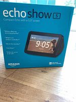 Front of Amazon Echo Show 5 box showing device image and size details with 5.5 inch screen.