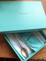 Tiffany & Co. blue box with silver spoon and matching felt pouch inside