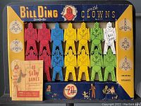 Complete game with 14 clown pieces and original box with colorful graphics