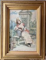 Full view of watercolor painting showing woman in garden with watering can, framed in gold gilt frame.