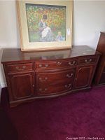 Front full view of buffet with framed artwork above