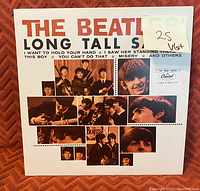 Front cover of 'Long Tall Sally' vinyl album by The Beatles with photo collage and track titles visible