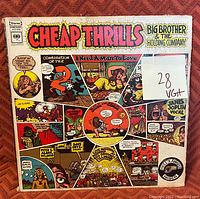 Front cover of Cheap Thrills by Big Brother & The Holding Company LP record with detailed comic-style graphic and grading sticker 28 Vg+