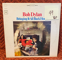 Front cover of Bob Dylan's 'Bringing It All Back Home' vinyl LP showing the album artwork and grading sticker.