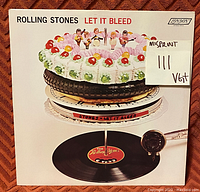 Front cover of Rolling Stones Let It Bleed vinyl record showing the album art and misprint label.