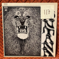 Front cover of Santana vinyl record showing lion's head artwork and stylized band logo.