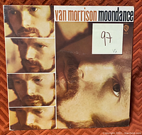 Photo of the front album sleeve of Van Morrison Moondance vinyl record with sticker showing grading as VG (Very Good) 97.