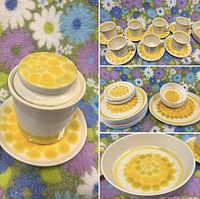 Photo of sugar dish with lid on matching saucer, and display of mugs and saucers showing yellow dot pattern.