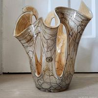 Front view of Krosno open loop glass vase showing marble illusion pattern and iridescent finish