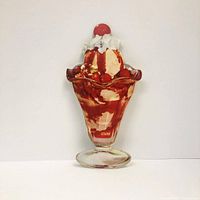 Colorful lithograph of an 11-inch tall sundae ice cream dessert in a glass dish with syrup, whipped cream, and cherry on top.