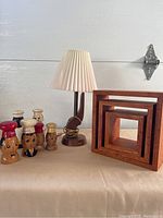 All items in the lot displayed together: lamp, nested shelves, and salt/pepper shakers