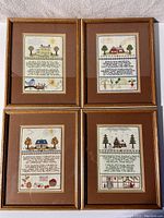 Four framed vintage embroidered pieces laid out, each representing a different season with corresponding images and poetic text.