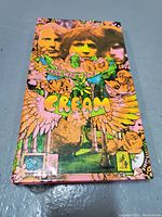 Front cover of the Cream Those Were The Days box set showing psychedelic artwork and band members.