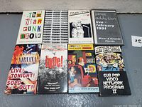 Top-down view of all 12 VHS tapes showing cover art including Nirvana, Sonic Youth, Jane's Addiction, and Sub Pop Video Network programs.