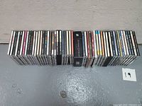Wide shot of the full CD lot showing about 50 jewel cases and a Duran Duran boxed set.