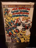 Front cover of Captain America comic book issue #269 showing vibrant vintage comic art with Captain America, Team America, and monster on bikes.