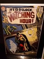 Front cover full view showing title The Witching Hour! Issue #9, DC Comics logo, 15 cents price, and detailed spooky cover art featuring a man with lantern and witch hands.