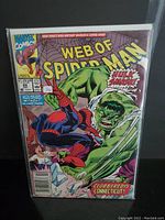 Front cover of Web of Spider-Man comic issue 69 showing Spider-Man and Hulk fight scene with Marvel Comics labeling and pricing info.