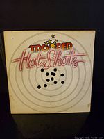 Front cover of Trooper Hot Shots vinyl album showing title and design
