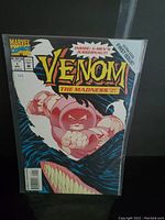 Front cover close-up showing the comic's title, main character Juggernaut punching forward, Venom's teeth at the bottom, and issue information.