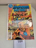 Photo of Doom Patrol #1 comic book first issue cover showing the bright colorful cover art and DC logo in the upper left corner.