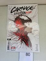 Front cover of Carnage Black White and Blood #1 second printing comic book in protective plastic sleeve showing character Carnage in black, white, and red.
