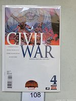 Front cover of Marvel Civil War issue #4 comic book showing characters and title.