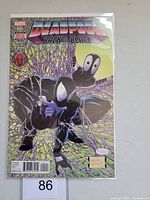 Front cover view of Deadpool Back in Black comic book issue #5 in protective plastic sleeve showing cover art with Deadpool in black suit.