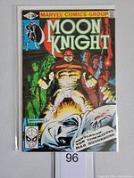 Comic book front cover with Moon Knight and villain characters, front view showing clear issue number and price.