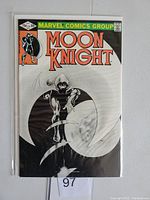 Front cover of Marvel Moon Knight comic book issue #15 from 1981 showing black and white illustration of Moon Knight with crescent moon shape, price 75 cents.