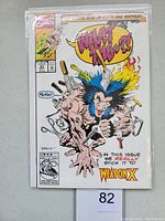 Front cover of Marvel What The?! comic book issue #21 featuring Weapon X character with weapons stuck in body, colorful early 90s style comic art, priced at 30 cents.