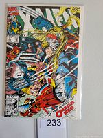 Front cover of Marvel X-Men #5 comic showing Wolverine fighting Omega Red.