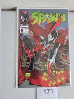 Front cover of Spawn #8 comic book showing character on red background with glowing symbols and Image Comics logo.