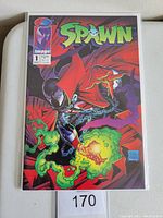 Front cover of Image Comics Spawn #1 comic book showing Spawn character with glowing green smoke and red cape on a dark background.