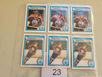 Front view of six Wayne Gretzky hockey cards arranged in two rows of three, showing Gretzky in Edmonton Oilers jerseys with OPC 75th Anniversary Series design.