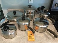 Full set of Revere Ware cookware including five pots with lids and one kettle