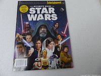 Front cover of the 2018 Entertainment Weekly magazine titled The Ultimate Guide To Star Wars with various Star Wars characters.