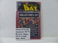 Front of the Batman Shadow of the Bat #1 Collector's Set showing title, artwork and list of included items: posters, pop-up, bookmarks.