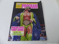 Front cover of WWF Program Magazine #167 showing Macho Man Randy Savage in wrestling attire and championship belt.