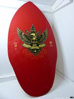 Full view of one red Seven Seas skim board showing shape and front artwork including winged skull and '4 Skims' text.