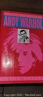 Photo of the front cover of the Andy Warhol biography book by Victor Bockris, showing artwork and title.