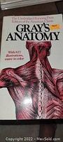 Photo of the book cover showing detailed anatomical illustration and title Gray's Anatomy.