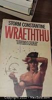 Front cover of Wraeththu book by Storm Constantine showing title and illustrated male figure.